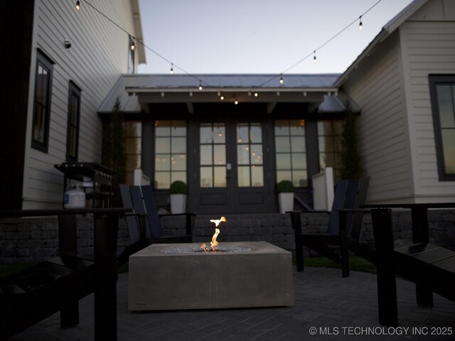 view of patio featuring a fire pit