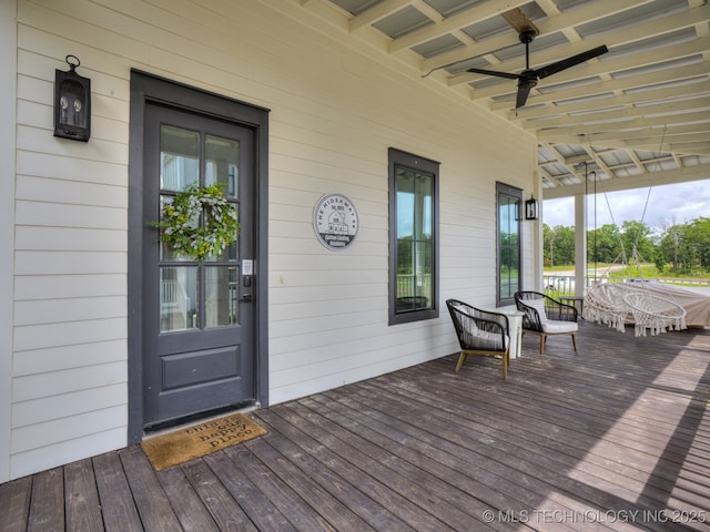 56 Center Ln N, Carlton Landing, OK 74432 - wooden deck featuring a ceiling fan