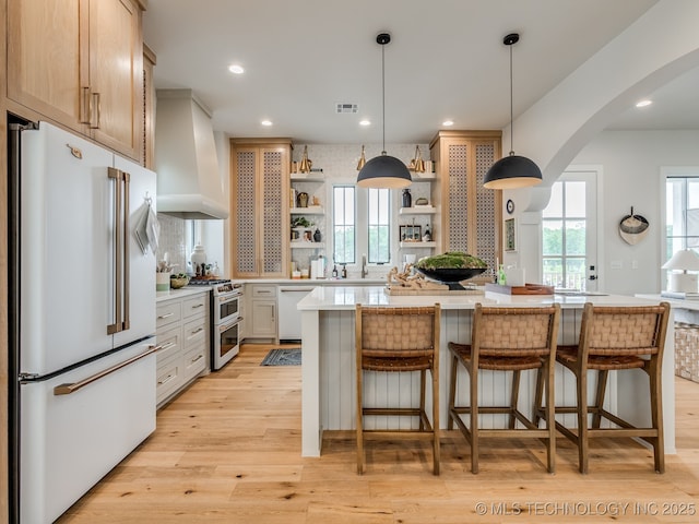 56 Center Ln N, Carlton Landing, OK 74432 - kitchen featuring freestanding refrigerator, double oven range, open shelves, premium range hood, and dishwasher