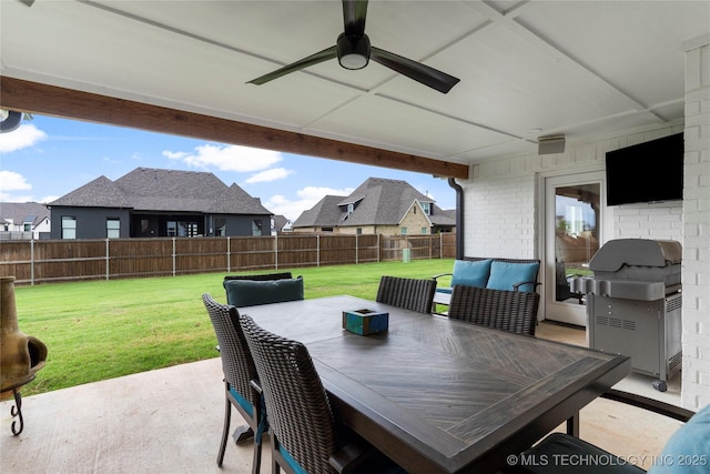 view of patio / terrace with a grill and ceiling fan