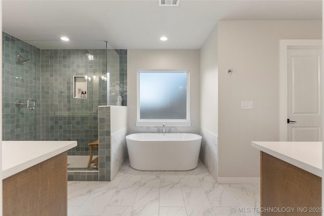 bathroom with plus walk in shower and vanity