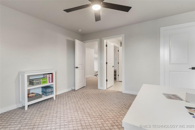 interior space featuring ceiling fan