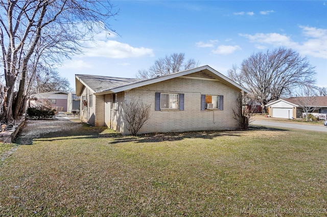 view of property exterior featuring a garage and a yard