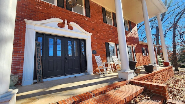 entrance to property with a porch