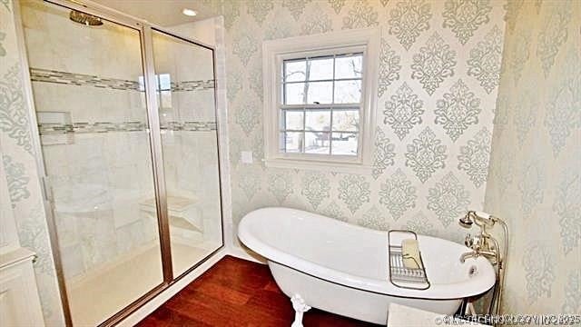 bathroom with plus walk in shower