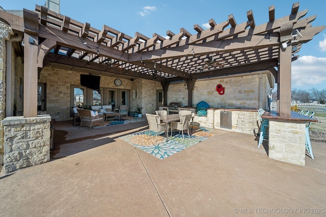 view of patio with grilling area, an outdoor living space, a pergola, and an outdoor bar