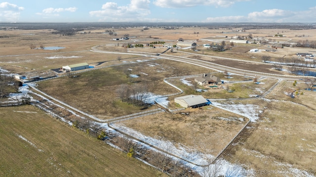 birds eye view of property featuring a rural view