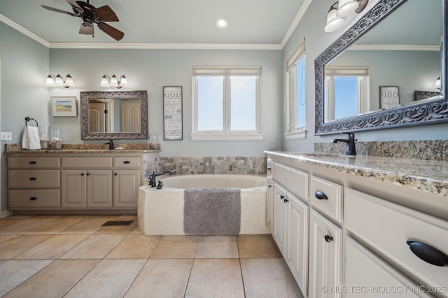 bathroom with a bathing tub, tile patterned flooring, vanity, ceiling fan, and crown molding