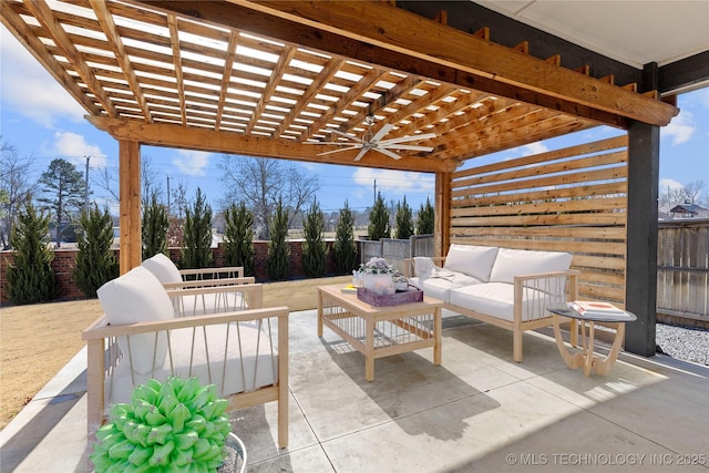 view of patio featuring ceiling fan, an outdoor living space, and a pergola