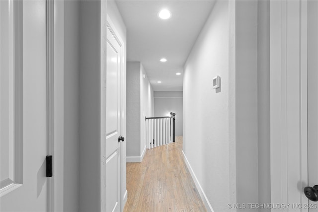 hallway featuring light hardwood / wood-style flooring