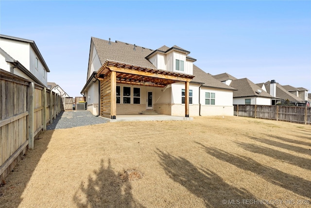 rear view of house featuring central air condition unit and a patio area