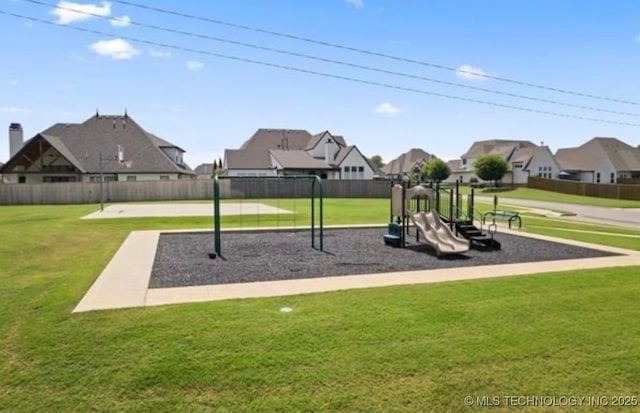 view of playground featuring a lawn