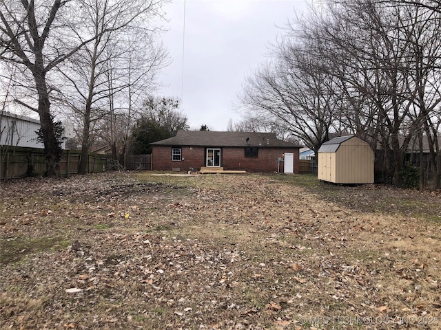 exterior space with a shed