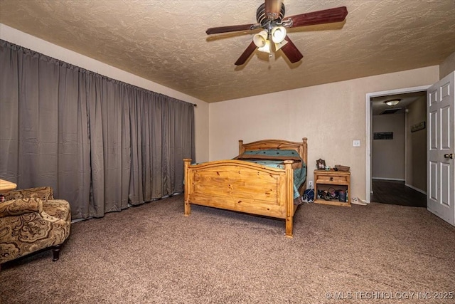 carpeted bedroom with ceiling fan and a textured ceiling