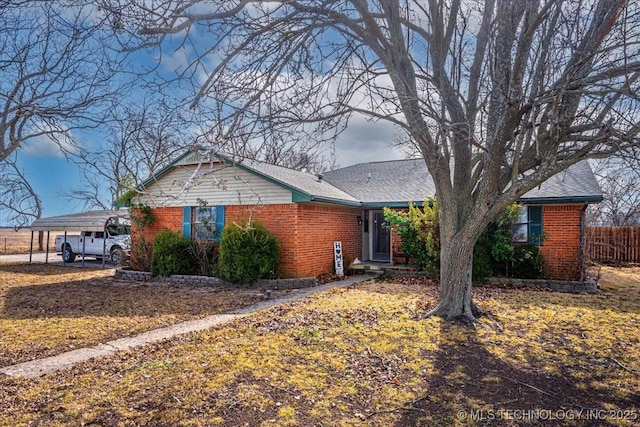 single story home with a carport