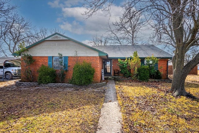 single story home with a carport