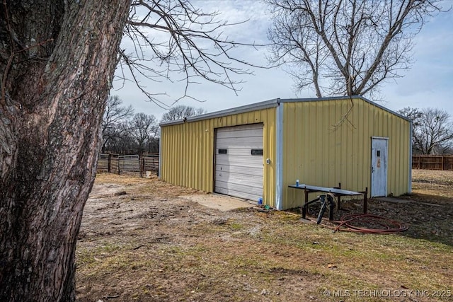 view of outbuilding featuring a garage