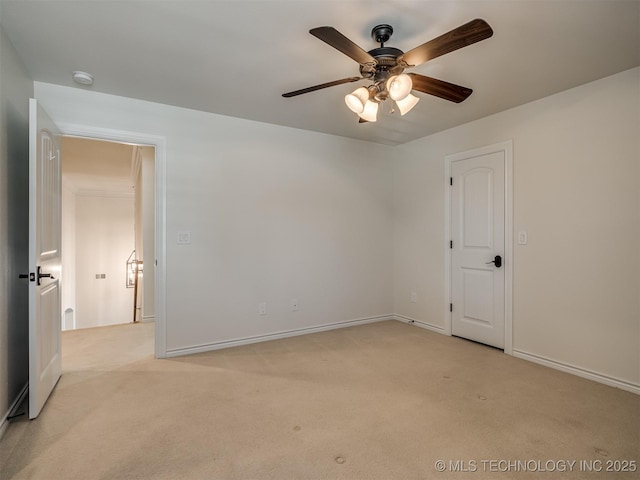 carpeted empty room with ceiling fan