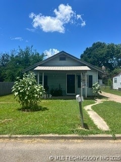 view of front of home with a front lawn