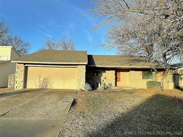 ranch-style house featuring a garage