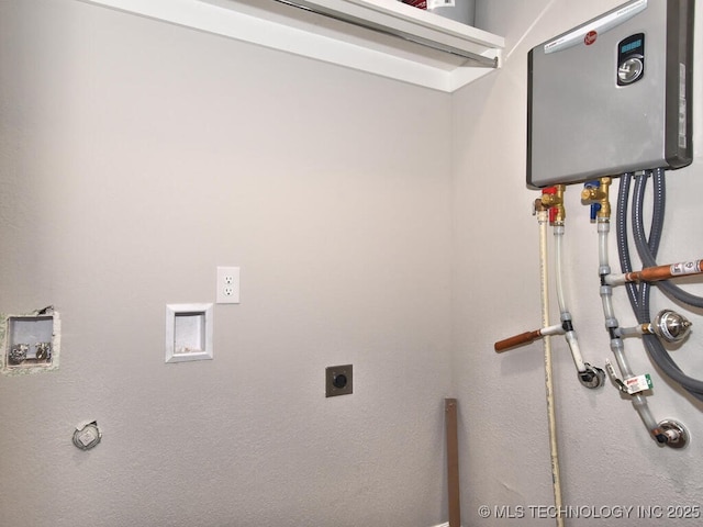 laundry room with washer hookup, water heater, and electric dryer hookup