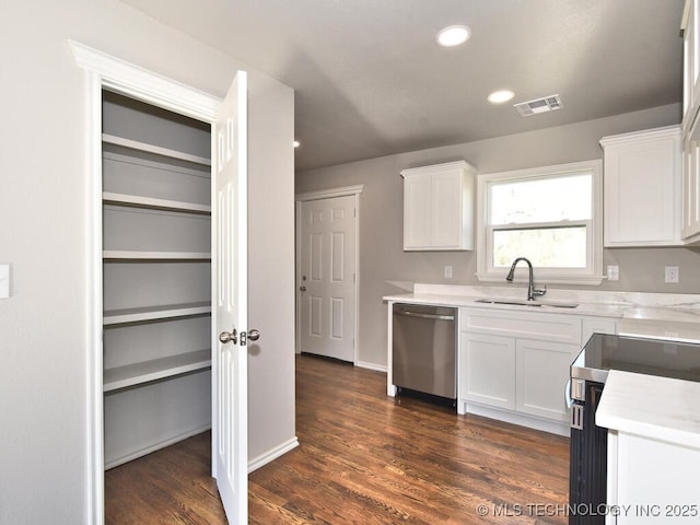 kitchen featuring white cabinetry, sink, electric range, and dishwasher