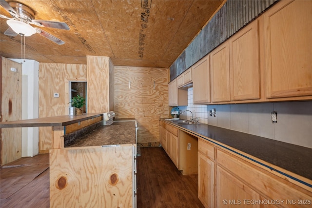 kitchen with sink, wood ceiling, and light brown cabinets