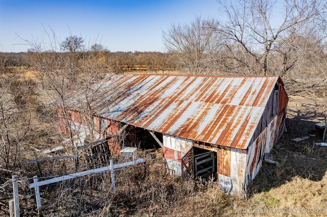 view of outbuilding with a rural view