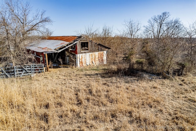 view of outbuilding featuring a rural view