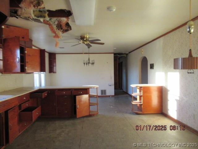 kitchen with ceiling fan and ornamental molding