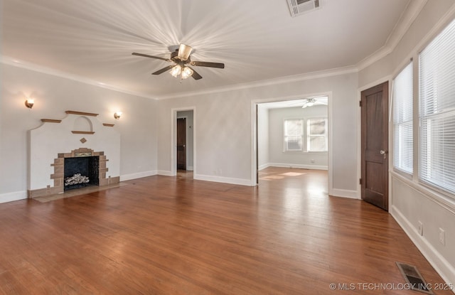 1531 S Florence Ave, Tulsa, OK 74104 - unfurnished living room with a fireplace, wood-type flooring, ceiling fan, and crown molding