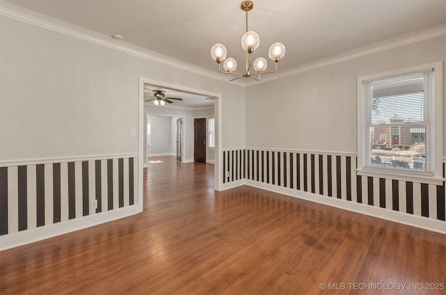 1531 S Florence Ave, Tulsa, OK 74104 - spare room with hardwood / wood-style flooring, ceiling fan with notable chandelier, and crown molding