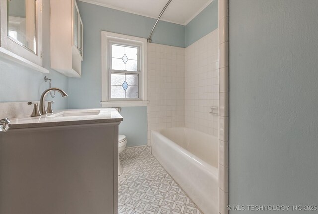 1531 S Florence Ave, Tulsa, OK 74104 - full bathroom with toilet, vanity, and tiled shower / bath combo