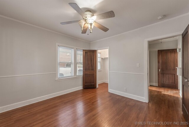 1531 S Florence Ave, Tulsa, OK 74104 - unfurnished bedroom with crown molding, dark hardwood / wood-style floors, a closet, and ceiling fan