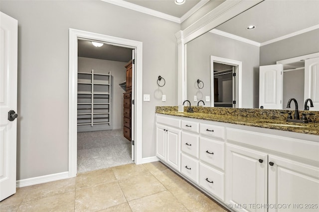 bathroom with vanity, tile patterned floors, and ornamental molding