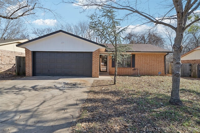 ranch-style home with a garage