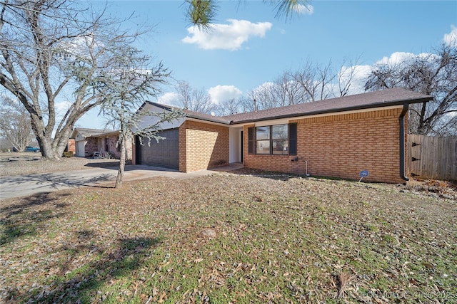 single story home featuring a garage