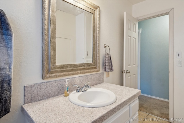 bathroom featuring vanity and tile patterned flooring