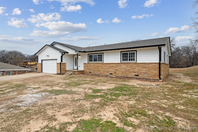 single story home featuring a garage