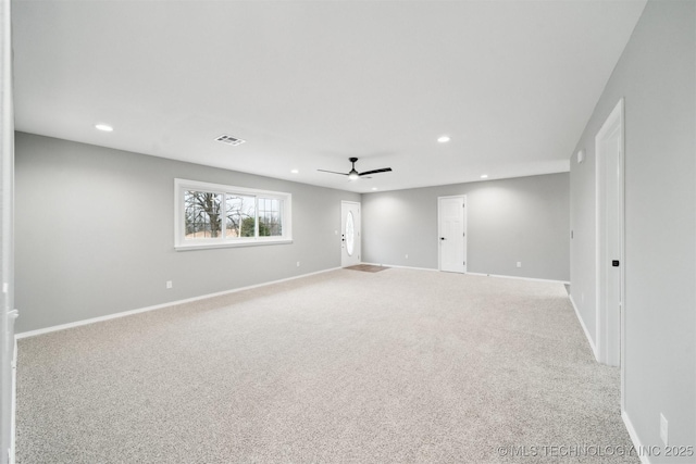 unfurnished room featuring carpet flooring and ceiling fan