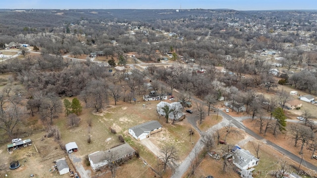 birds eye view of property featuring a rural view