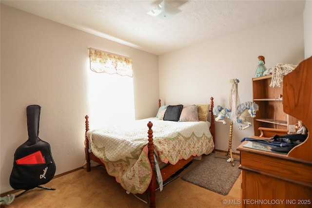 bedroom featuring carpet