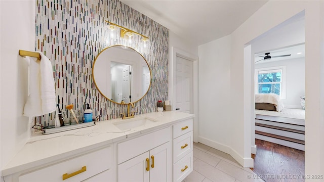 bathroom with vanity, tile patterned flooring, and ceiling fan