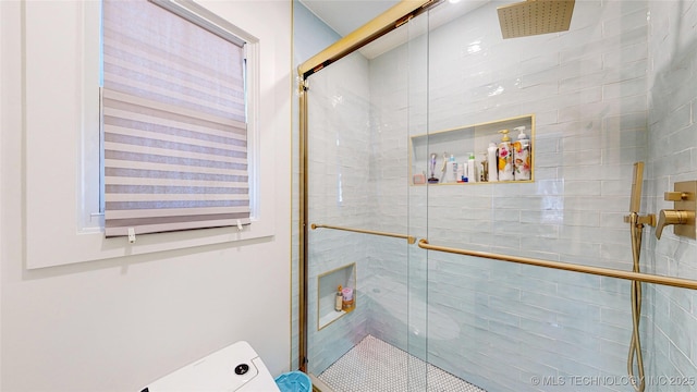 bathroom featuring walk in shower