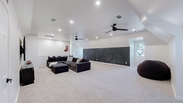 carpeted cinema featuring ceiling fan and lofted ceiling