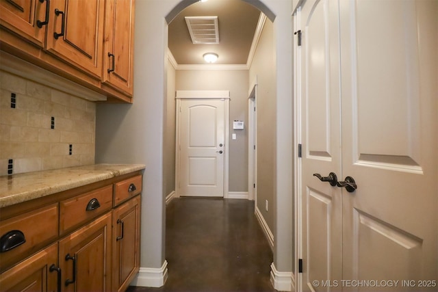 corridor with ornamental molding