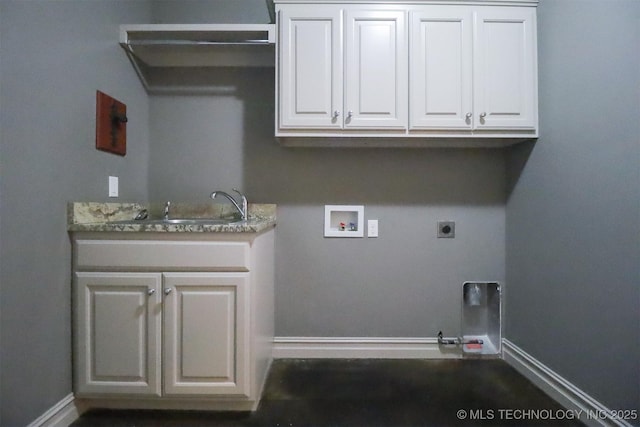 laundry area with gas dryer hookup, sink, cabinets, washer hookup, and hookup for an electric dryer