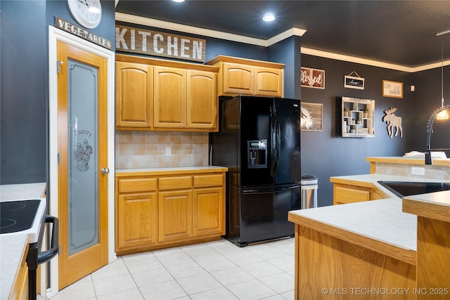 kitchen featuring sink, backsplash, ornamental molding, light tile patterned flooring, and black fridge with ice dispenser