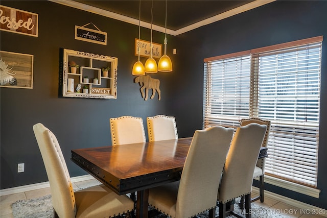 tiled dining space with crown molding