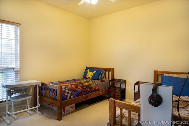 bedroom with carpet floors and ceiling fan